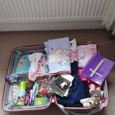 Freya Smith evacuee suitcase
